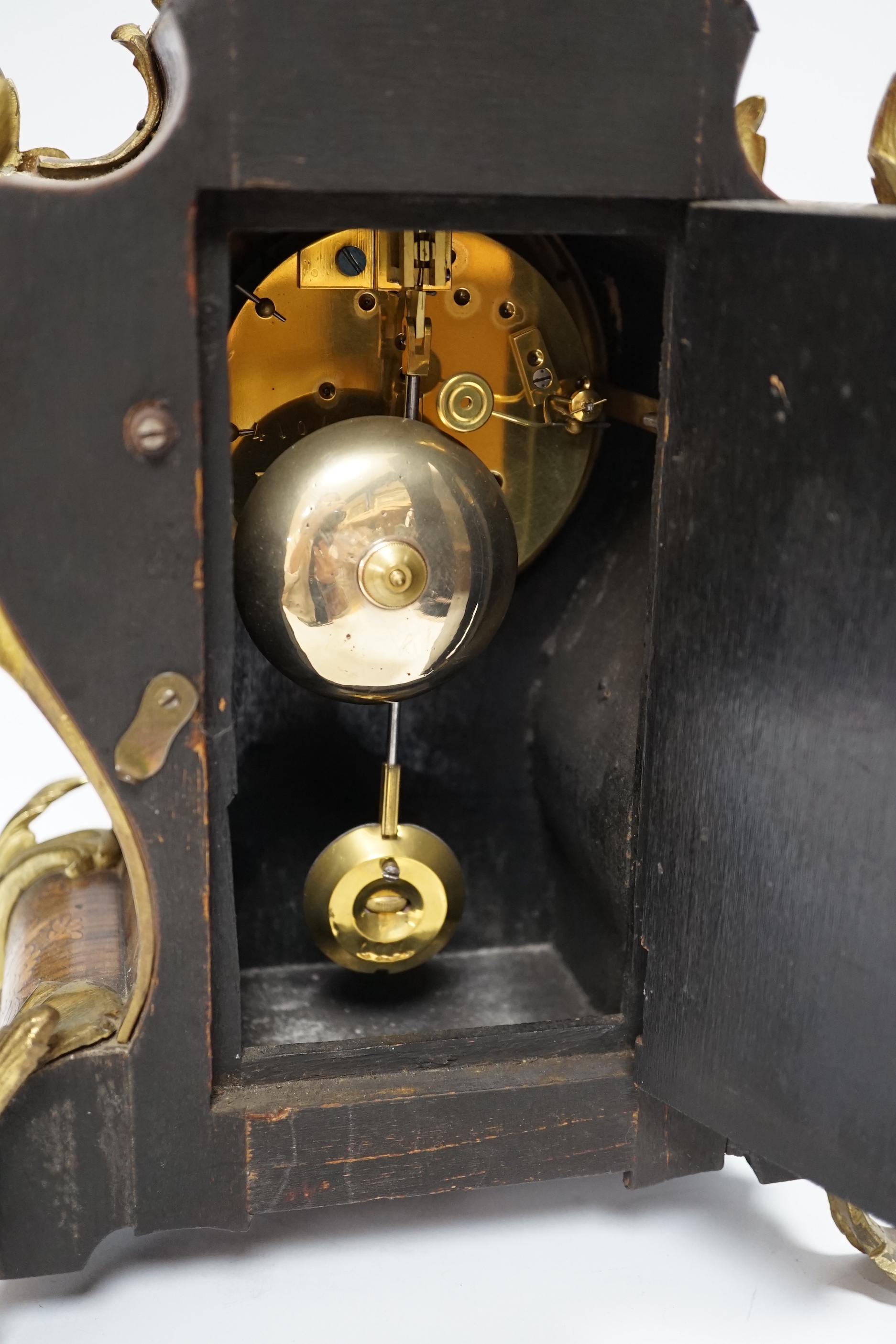 A French gilt metal mounted rosewood and floral marquetry mantel clock. 40cm